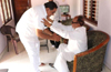 Ramanath Rai calls on Janardhan Poojary, seeks blessings
